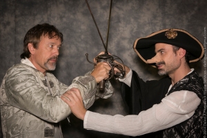 Valvert (Scott Simpson) challenges Cyrano to a duel